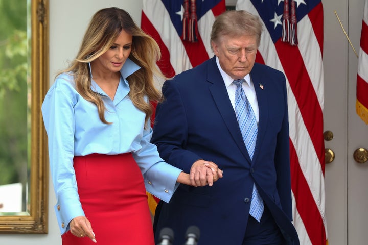 President Donald Trump and first lady Melania Trump arrive during an event announcing the expansion of a foster care initiative in the Rose Garden of the White House on August 20, 2026 in Washington, DC.