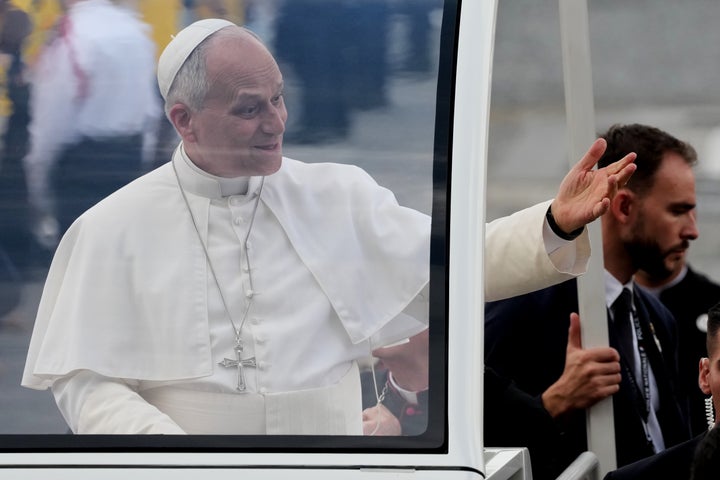 Pope Leo XIV greets faithful as he arrives to celebrate mass at Place de la Concorde, Paris, Saturday, Sept. 26, 2026. (AP Photo/Gregorio Borgia)
