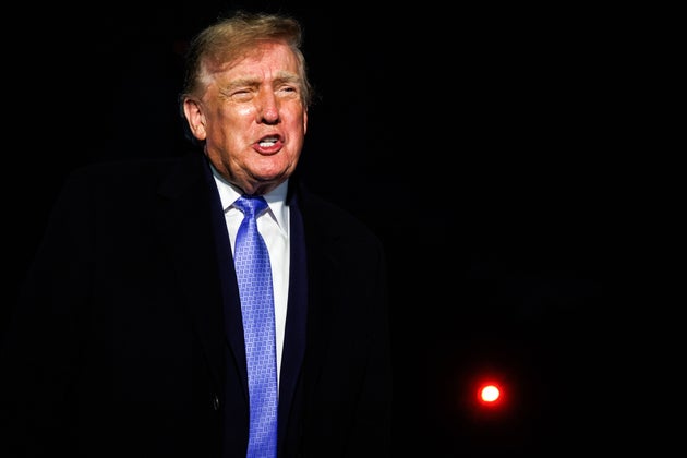 President Donald Trump speaks to members of the media on the South Lawn of the White House.