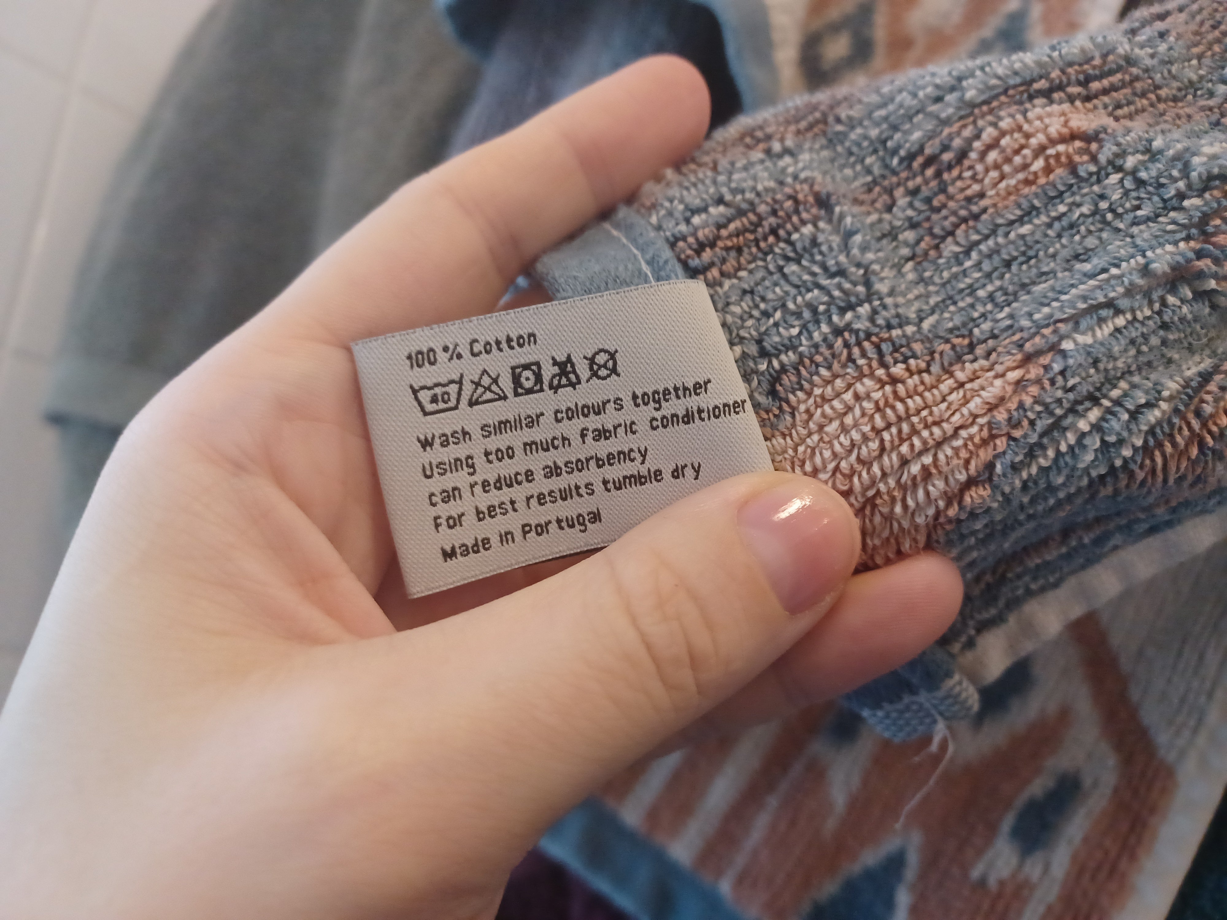 I Just Learned A Common Laundry Mistake Is Making My Towels Less Absorbent