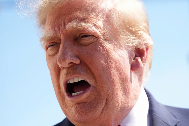 President Donald Trump speaks with reporters before boarding Marine One on the South Lawn of the White House, Thursday Oct. 1, 2026, in Washington.