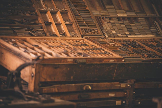 To understand the origin of the terms uppercase and lowercase, it’s helpful to get a visual of old printing press systems with individual metal letter blocks sorted in cases. 