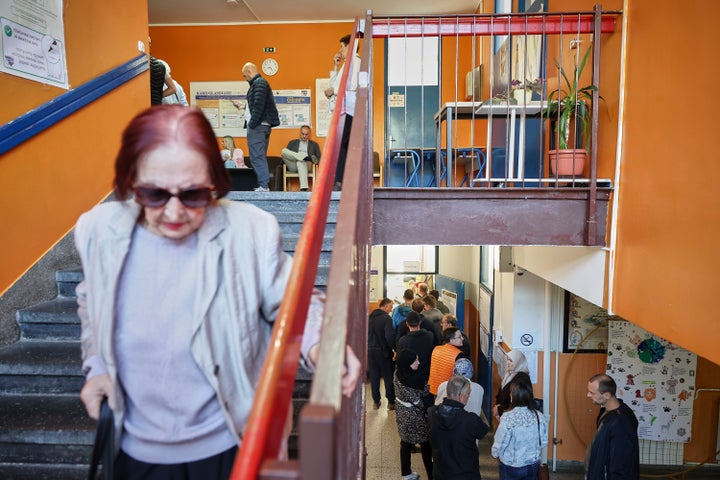 People wait to cast their votes during the general election in Sarajevo, Bosnia, Sunday, Oct. 4, 2026. (AP Photo/Armin Durgut)
