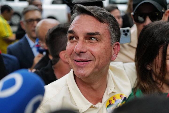 Opposition presidential candidate Sen. Flavio Bolsonaro arrives to vote during general elections in Rio de Janeiro, Sunday, Oct. 4, 2026. (AP Photo/Lucas Landau)