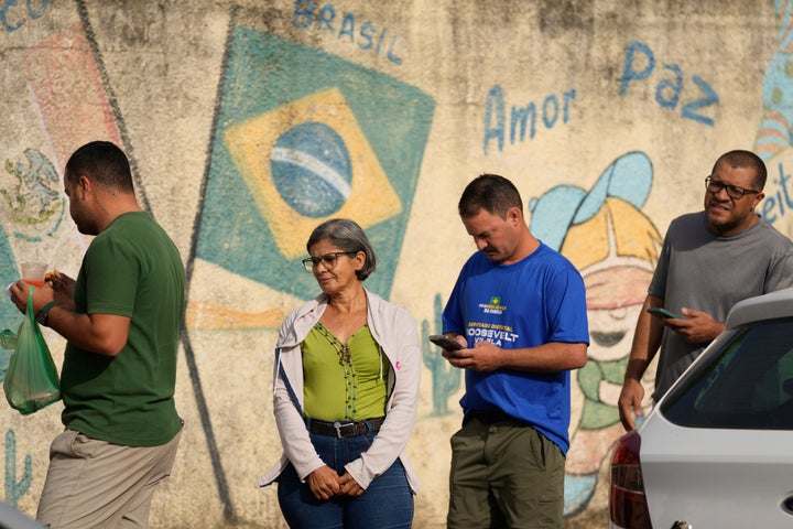 Voters line up at a polling station during general elections in Brasilia, Brazil, on Oct. 4, 2026.