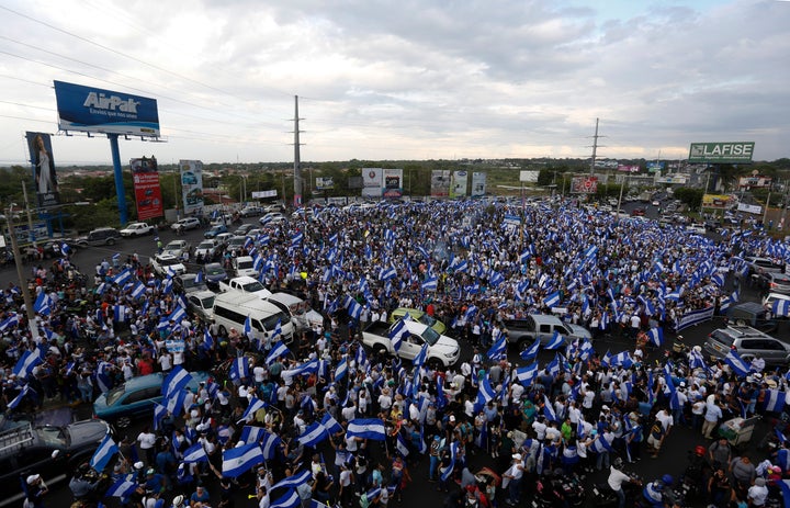 FILE - People protest at the Jean Paul Genie roundabout against the government of President Daniel Ortega, in Managua, Nicaragua, on May 15, 2018. (AP Photo/Alfredo Zuniga, File)