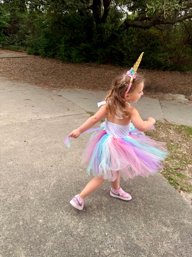 The author's older daughter at her fourth birthday party. “Teaching our daughters the skills that they need to survive feels like clipping their fairy wings,” she writes.