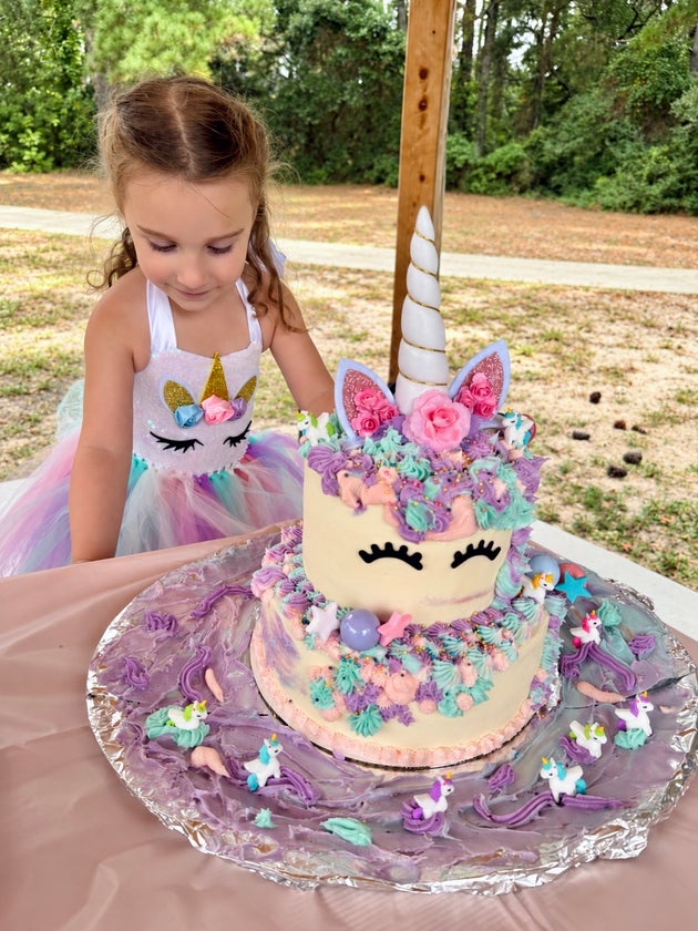 “Her innocence is like a balloon, lifting her above the harsh realities of being born into a female body,” the author writes of her 4-year-old daughter.