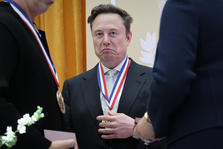 Elon Musk reacts after receiving the National Medal of Science at President Donald Trump's Golden Age of American Innovation Summit last week.