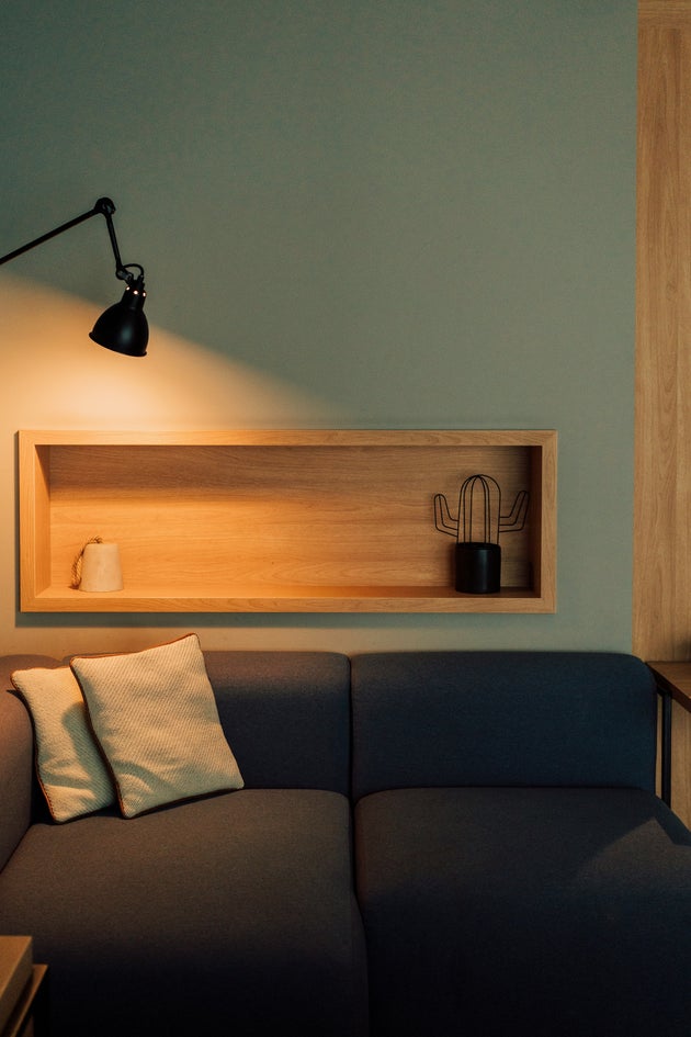 Shun the big light in favour of a warm-hued lamp to get ready for sleep.