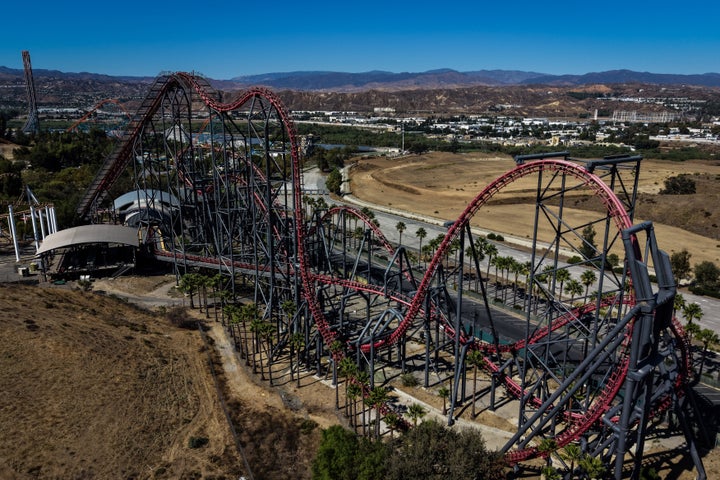 FILE - This aerial view shows the X2 roller coaster at Six Flags Magic Mountain in Valencia, Calif., on Sept. 23, 2026. (AP Photo/Jae C. Hong, File)