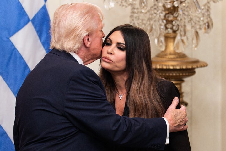 Trump kisses Guilfoyle during a Greek Independence Day celebration in the East Room of the White House on March 26, 2026.