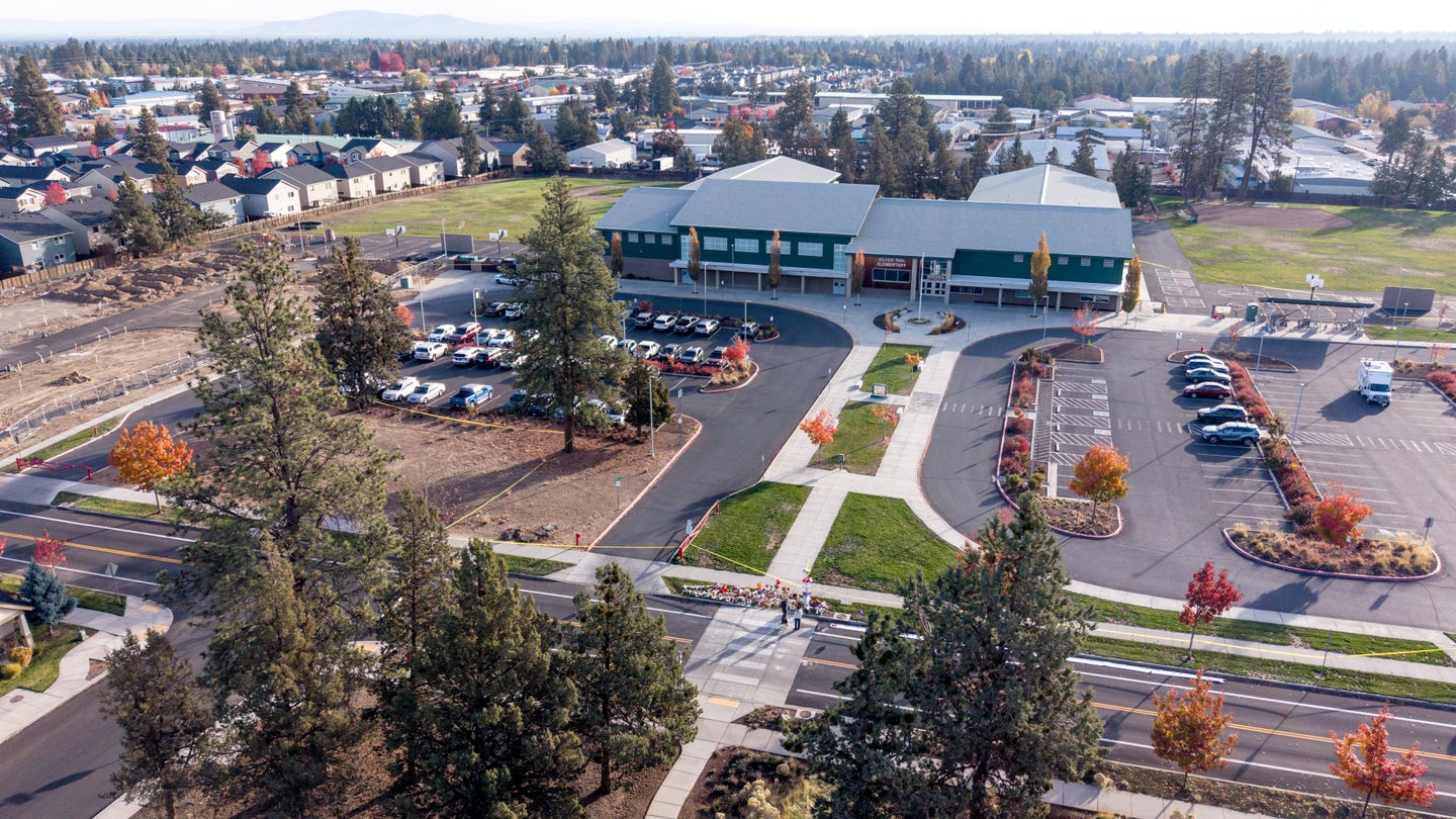 This aerial view shows Silver Rail Elementary School in Bend, Oregon, on October 17, 2026. Three children and one teacher were shot dead at an elementary school