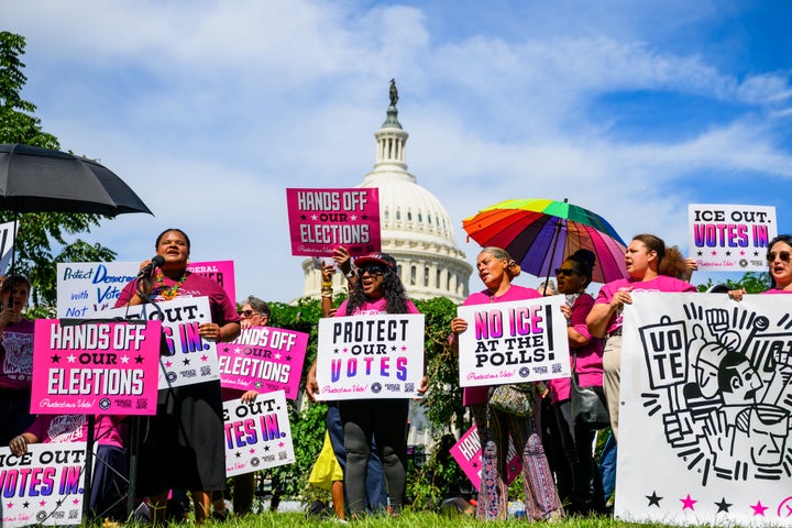 Demonstrators hold signs at a voting-rights rally outside the U.S. Capitol in Washington, D.C., on Sept. 15, 2026.