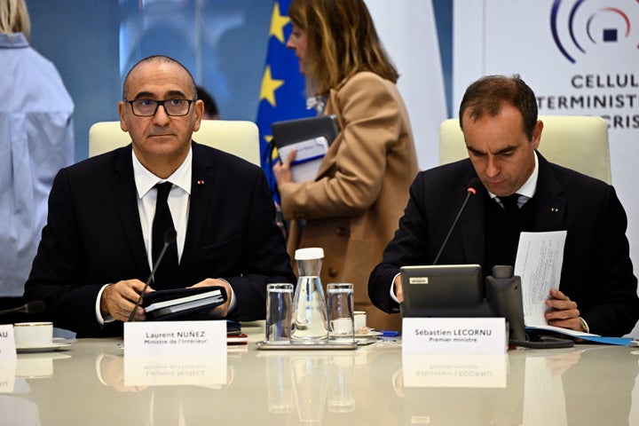 France's Interior Minister Laurent Nunez and Prime Minister Sebastien Lecornu attend an Interministerial Crisis Meeting at the Interior Ministry in Paris on Oct. 19, 2026, two days after riots and looting on the sidelines of nationwide protests against the "high cost of living.”