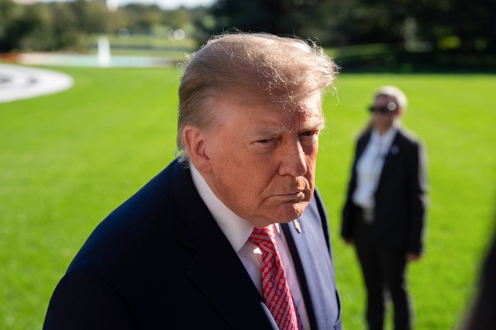 President Donald Trump speaks to members of the media on the South Lawn of the White House before boarding Marine One in Washington, D.C., on Oct. 19, 2026. 