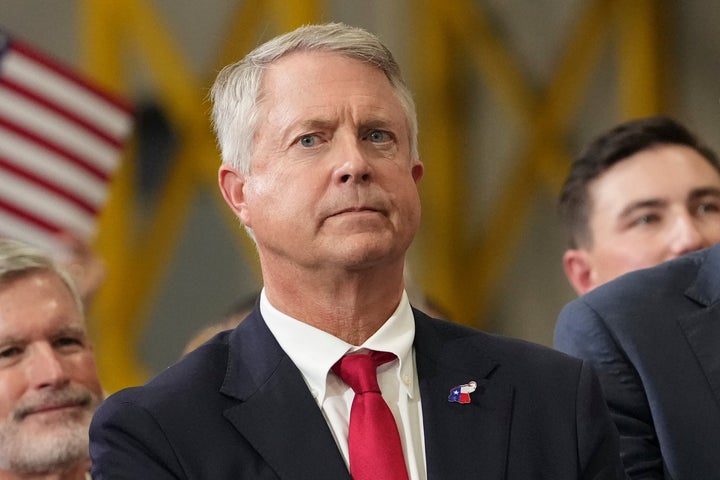 Sen. Roger Marshall, listening to Vice President JD Vance during a Kansas midterms rally last month.
