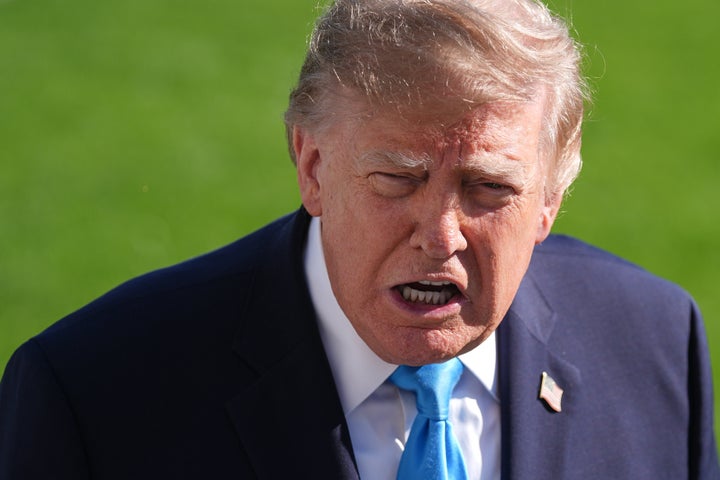 President Donald Trump speaks to press members before boarding Marine One on the South Lawn of the White House in Washington, D.C., on Oct. 5, 2026.