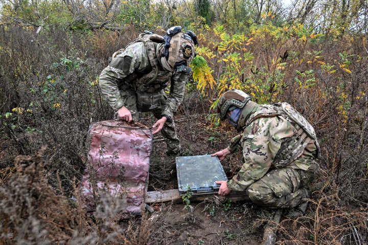 Soldiers from a separate task rifle battalion of the National Police of Ukraine in the Zaporizhzhia region take a camouflage case off a Starlink satellite communication terminal to be set up at a combat position in the Donetsk region, Ukraine, October 16, 2026. (Photo by Dmytro Smolienko/Ukrinform) (Photo credit should read Dmytro Smolienko/ Ukrinform/Future Publishing via Getty Images)