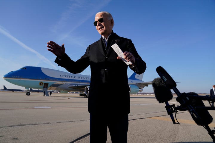 President Joe Biden speaks to members of the media before boarding Air Force One at Milwaukee Mitchell International Airport, Wednesday, Dec. 20, 2023, in Milwaukee. (AP Photo/Evan Vucci)
