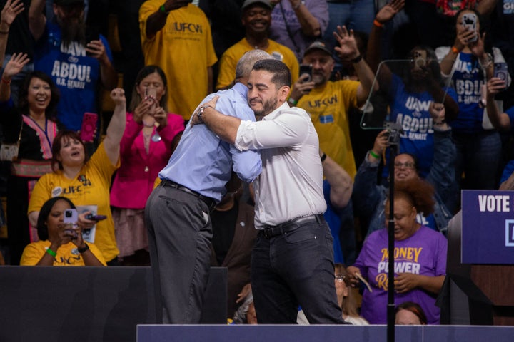 Former US President Barack Obama shares a hug with Michigan Democrat senatorial candidate Abdul El-Sayed on stage at a midterm campaign rally in Detroit, Michigan on October 24, 2026. (Photo by Bill Pugliano / AFP via Getty Images)