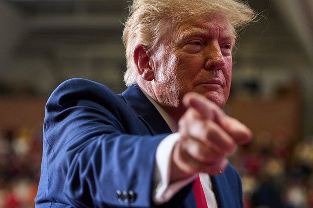 President Donald Trump points while departing after speaking during a campaign rally at McMorran Place Sports and Entertainment Center, Sunday, Oct. 25, 2026, in Port Huron, Mich. 