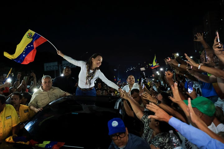 Opposition leader Maria Corina Machado and her allies have been demanding a date for a presidential election in Venezuela, but U.S. officials have emphasized economic stabilization first.