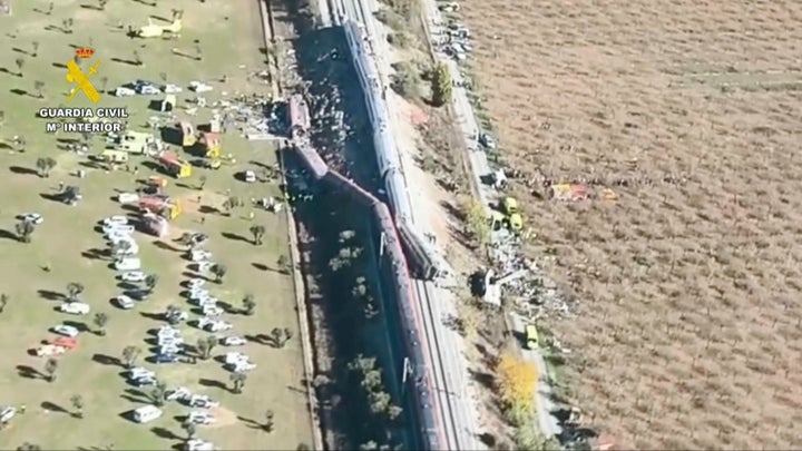 This framegrab taken from a video provided by Guardia Civil shows an aerial view of carriages and first responders on the site of a collision between two trains in Urda, Spain, on Oct. 28, 2026.