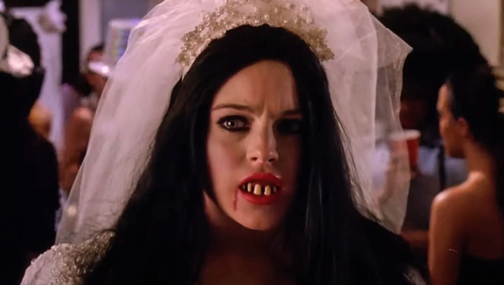 Lindsay Lohan as "an ex-wife" in Mean Girls