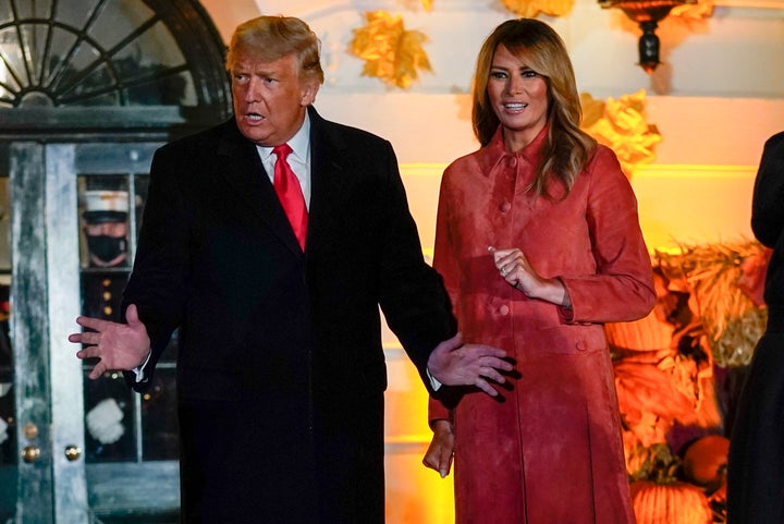 Donald Trump and first lady Melania Trump greet trick-or-treaters at the White House in 2020.