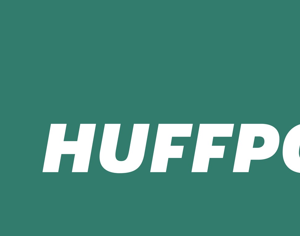 Attorney Jonathan Moore, back and center, at a November 2014 press conference with Rev. Al Sharpton and the families of Eric 