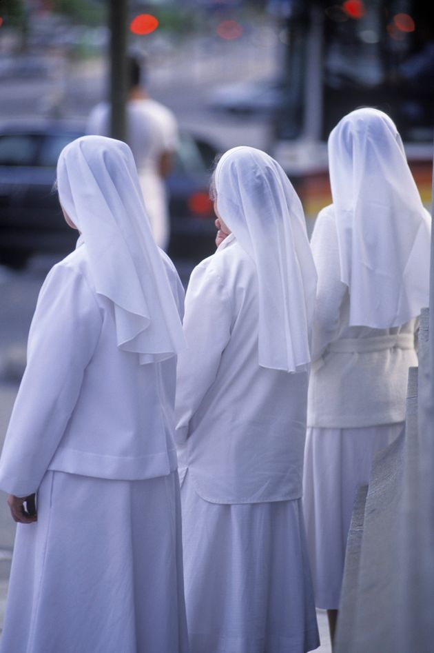<span class='image-component__caption' itemprop="caption">Nuns on the street, Montreal, Quebec, Canada.</span>